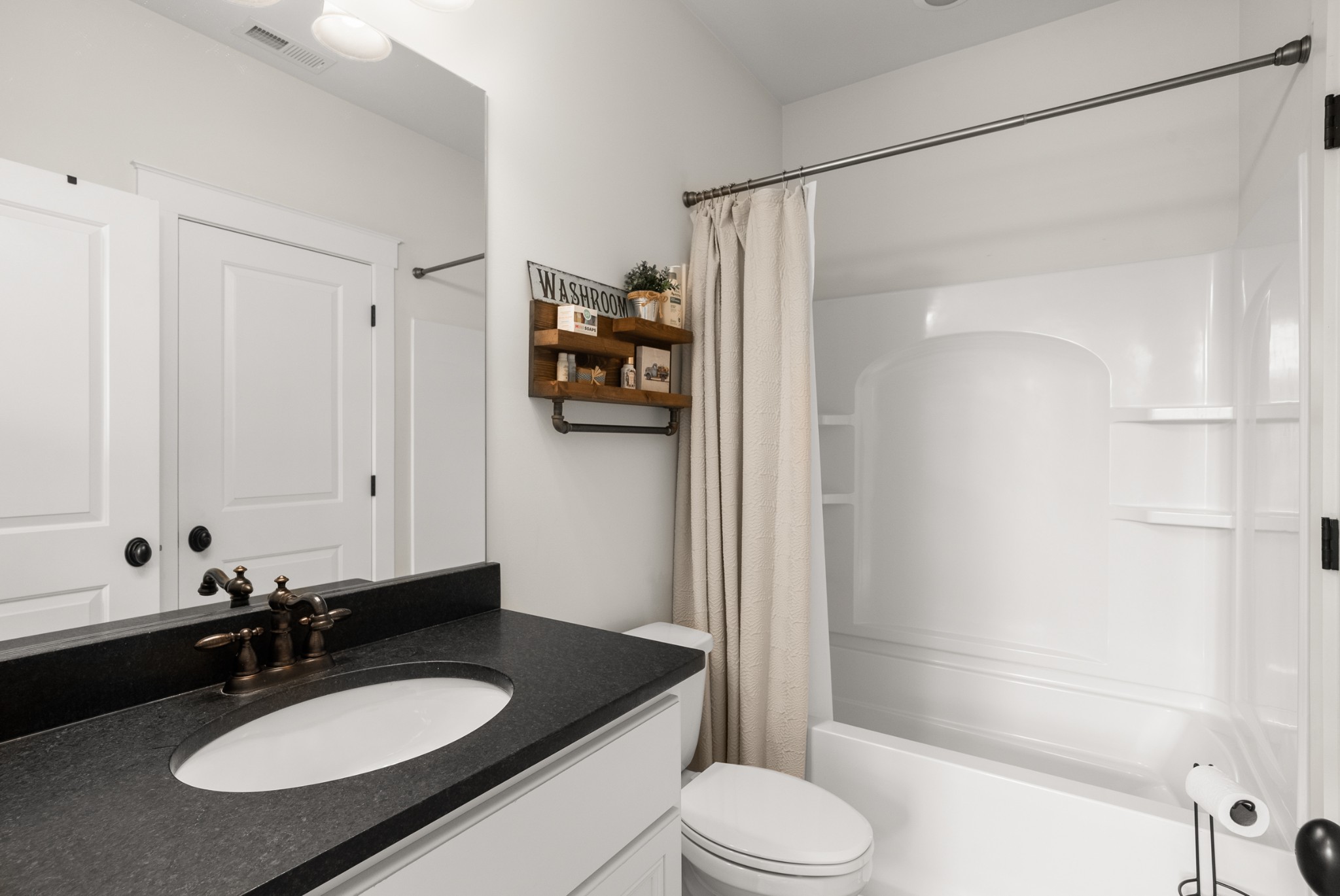 412 Boyd Mill Avenue Franklin, TN 37064 - Photo 35 of 53 a bathroom with a granite countertop sink toilet and shower