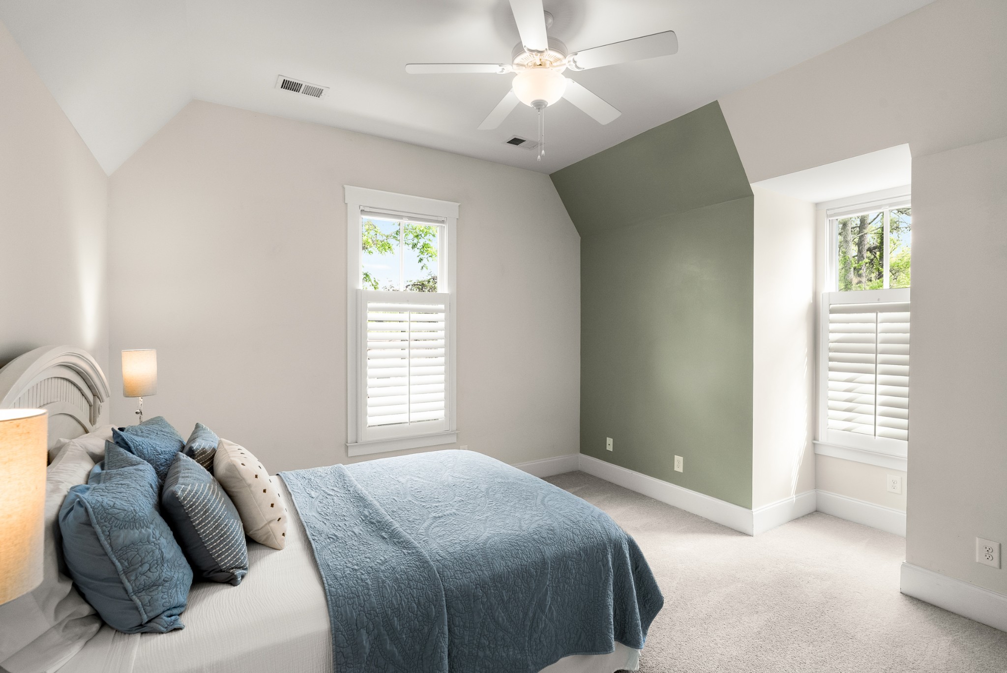 412 Boyd Mill Avenue Franklin, TN 37064 - Photo 37 of 53 a bedroom with a bed and a chandelier