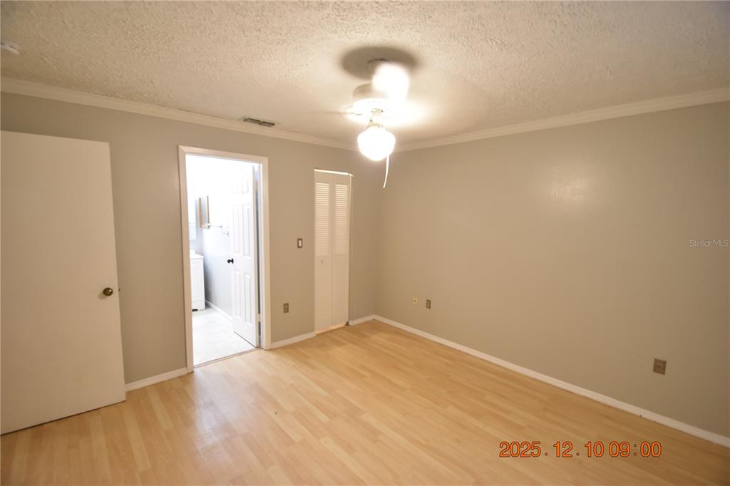 5824 Grey Street New Port Richey, FL 34652 - Photo 18 of 28 wooden floor in an empty room