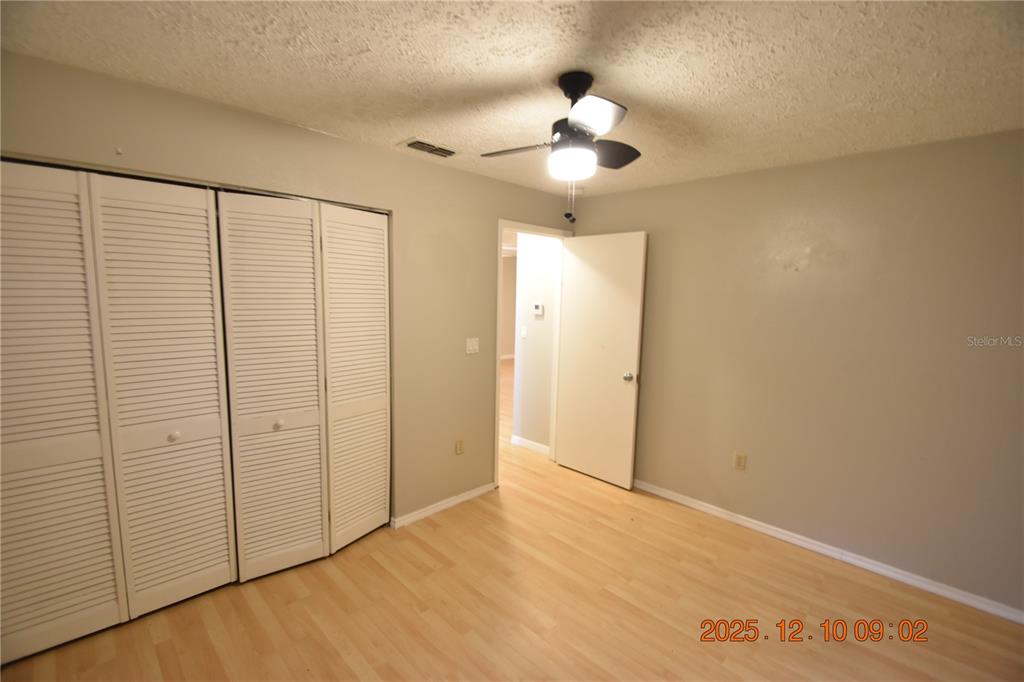 5824 Grey Street New Port Richey, FL 34652 - Photo 23 of 28 wooden floor in an empty room