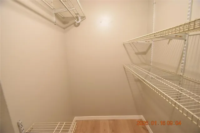 a view of a room with racks on the wall