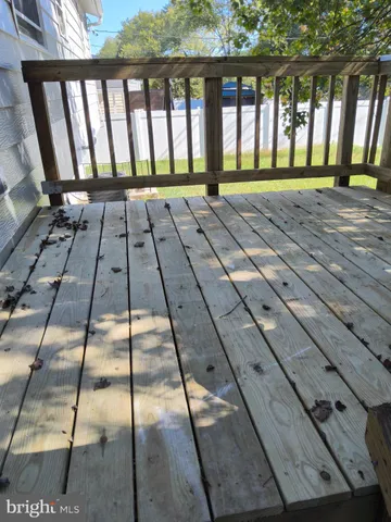 a view of gallery with wooden floor