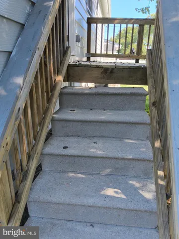 a view of gallery with wooden floor