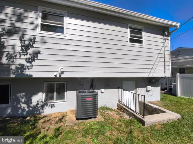 a street sign on a pole on a street