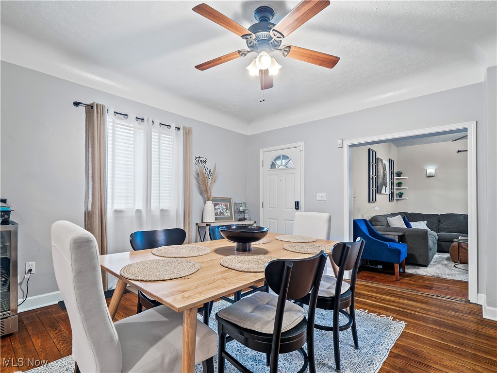 1727 Randall Road Cleveland, OH 44113 - Photo 9 of 40 Dining area with ceiling fan and dark wood-style floors