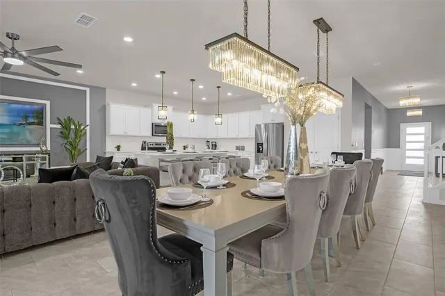 a view of a dining area and chandelier