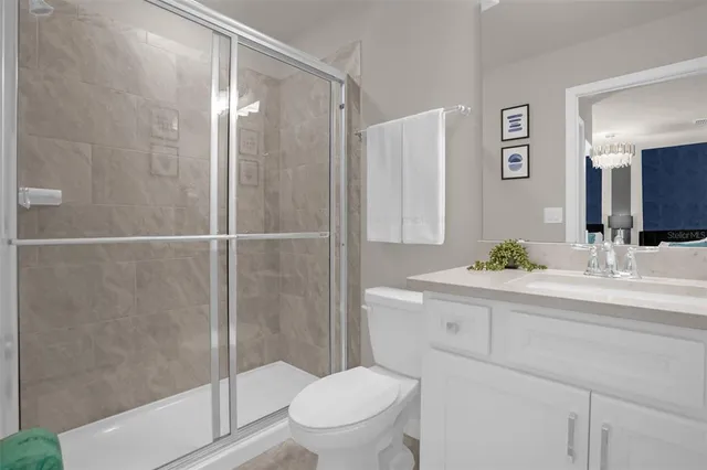 a view of a swimming pool with a lounge chairs