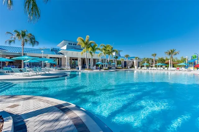 a very nice looking room with lots of stuff and plants