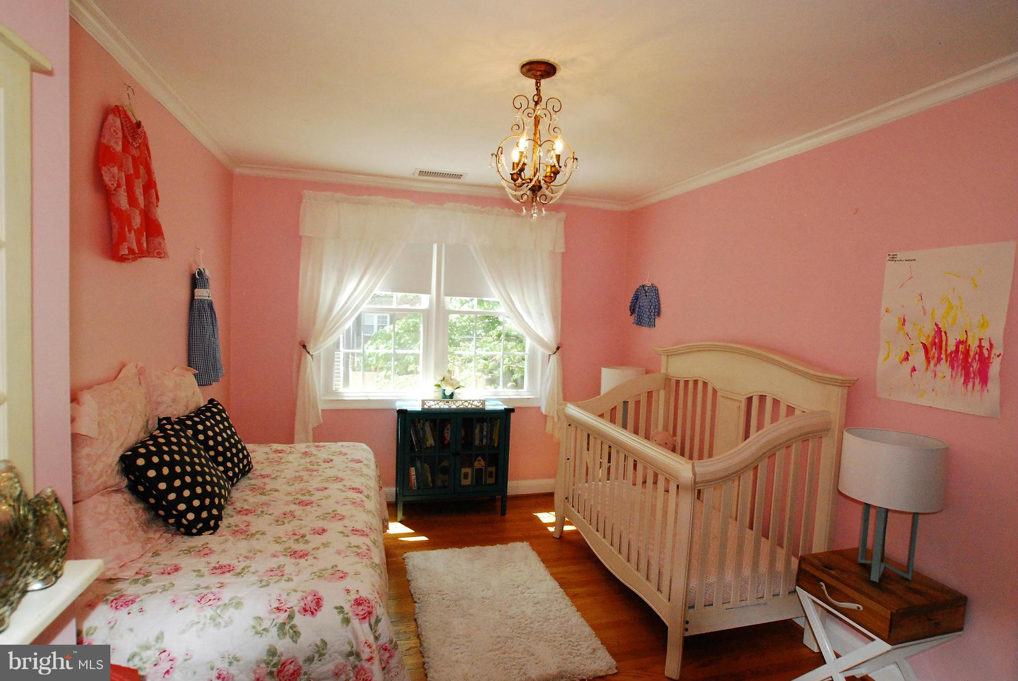 195 Stanmore Road Baltimore, MD 21212 - Photo 14 of 22 a bedroom with furniture and a window
