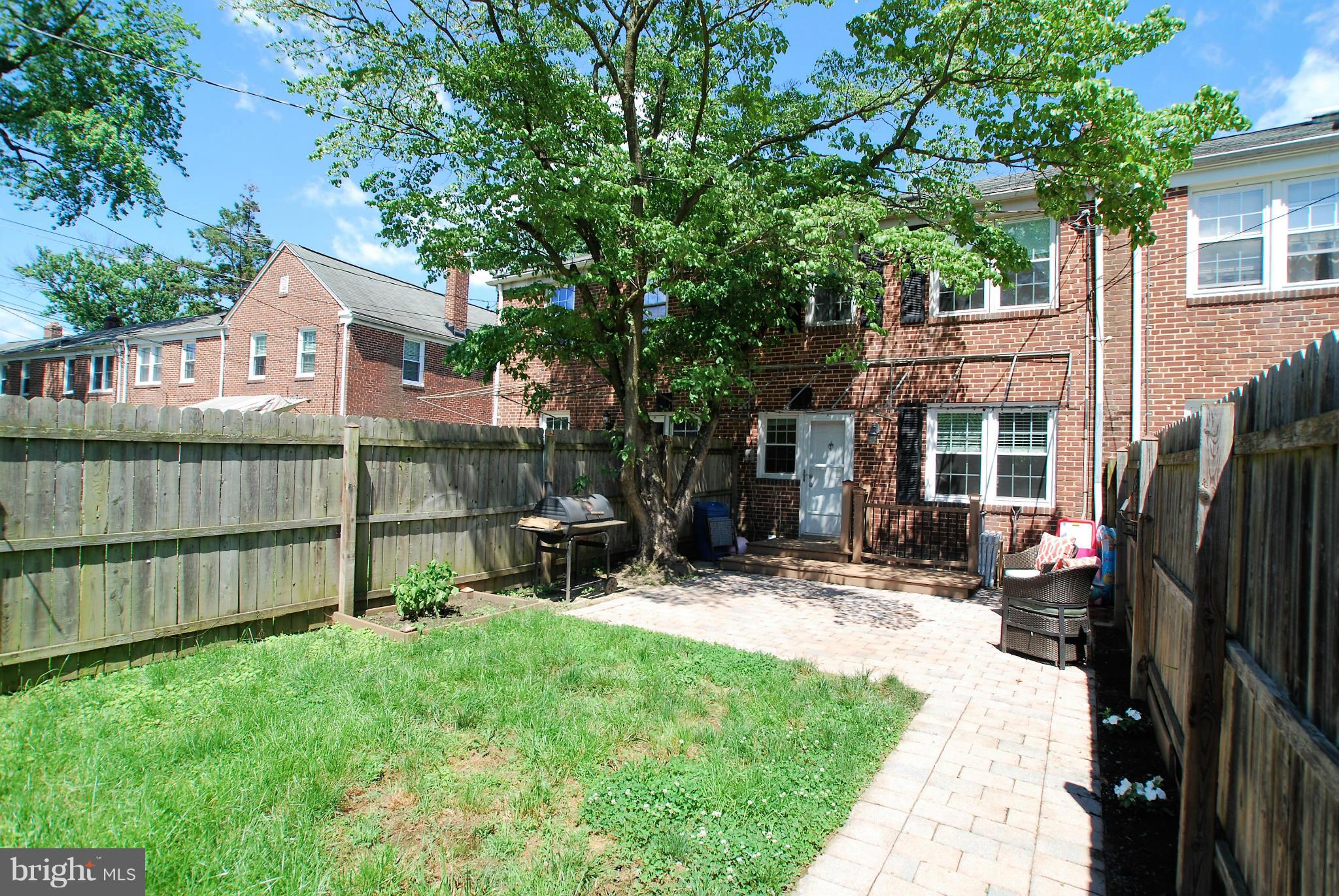 195 Stanmore Road Baltimore, MD 21212 - Photo 20 of 22 a view of a chair and table in backyard of the house