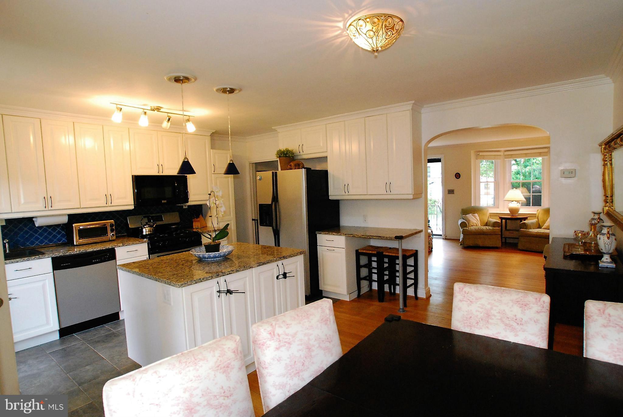 195 Stanmore Road Baltimore, MD 21212 - Photo 8 of 22 a large kitchen with a large counter top appliances and cabinets