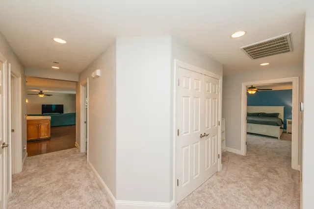 a view of yard with wooden fence