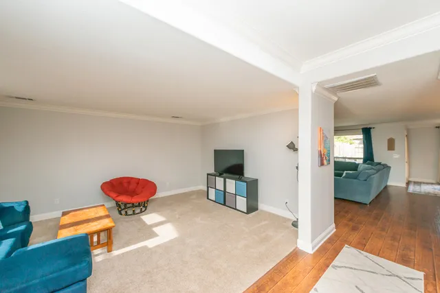 a view of a livingroom with a flat screen tv
