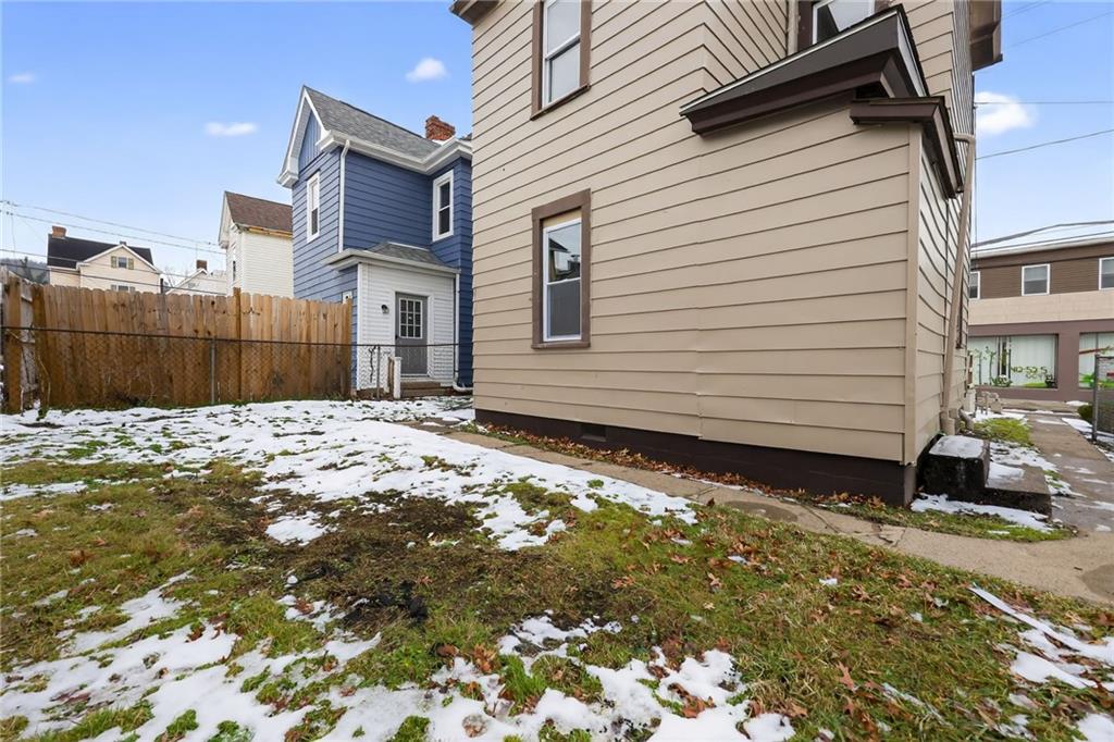 405 Main Street Coraopolis, PA 15108 - Photo 2 of 15 a front view of a house with a yard