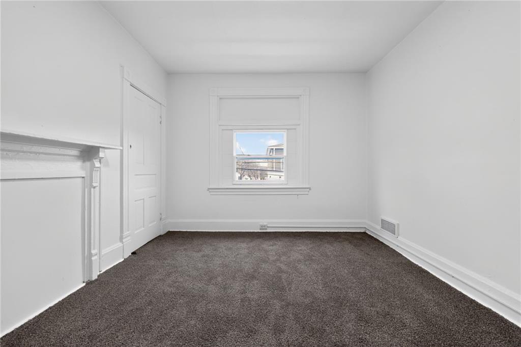 405 Main Street Coraopolis, PA 15108 - Photo 3 of 15 an empty room with a window