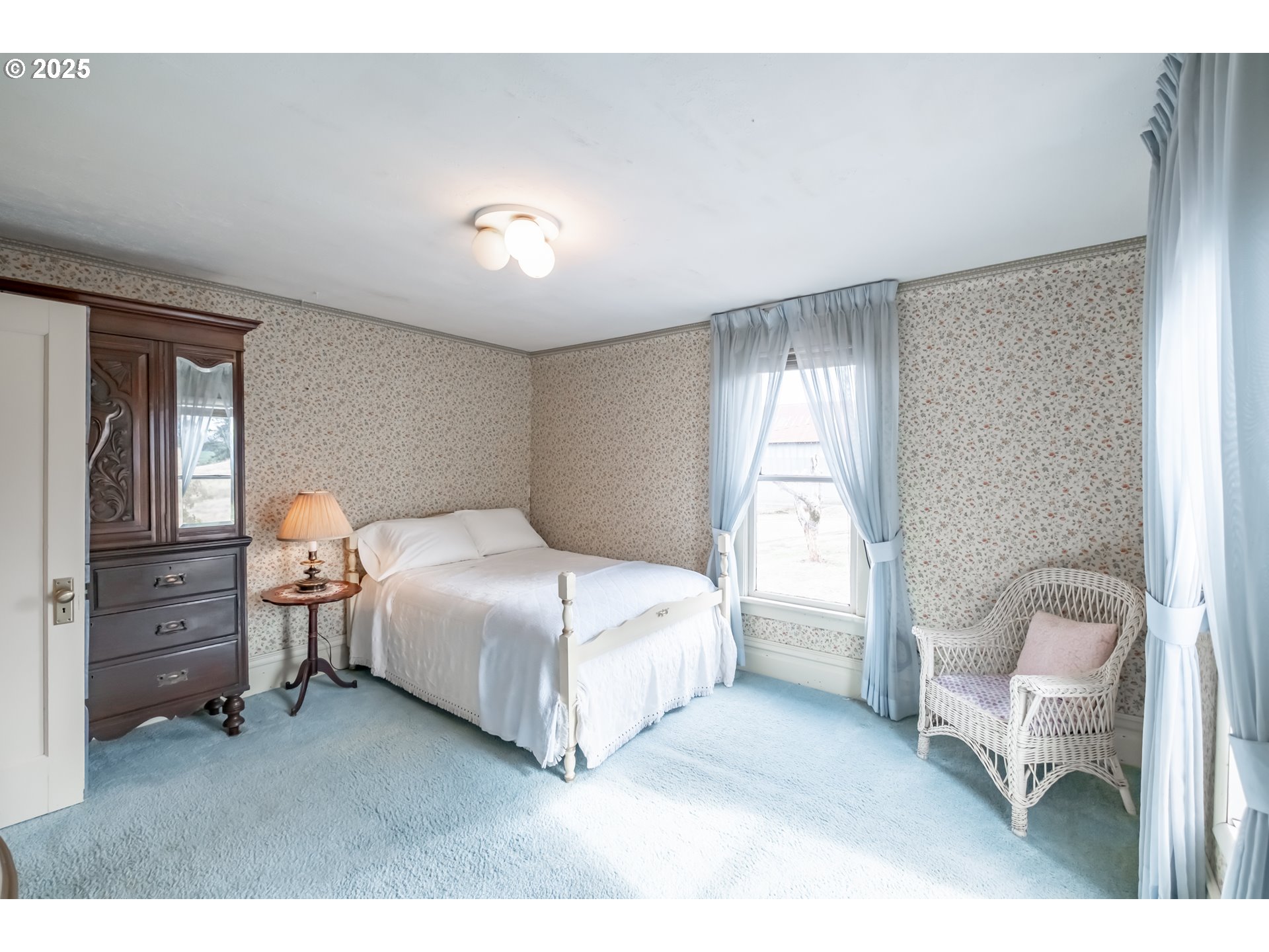 39986 Gisler Road Scio, OR 97374 - Photo 21 of 45 a bedroom with a bed and a chair