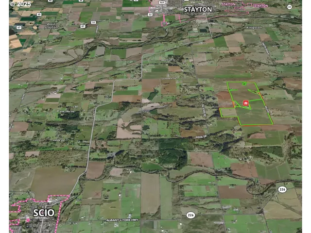 a aerial view of a residential houses with outdoor space