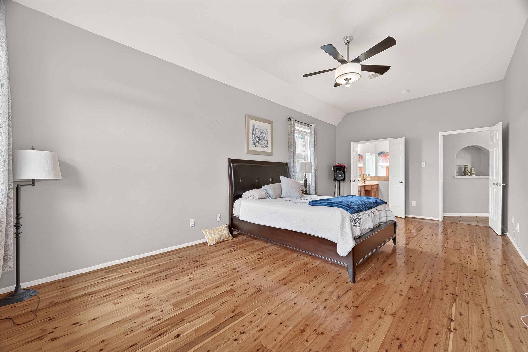 9110 Cavalier Lane Rosenberg, TX 77469 - Photo 23 of 30 Spacious primary bedroom. A peaceful space to relax and a happy way to start your day.