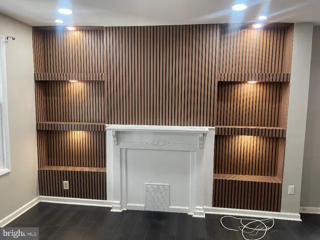 a kitchen with a refrigerator and a stove