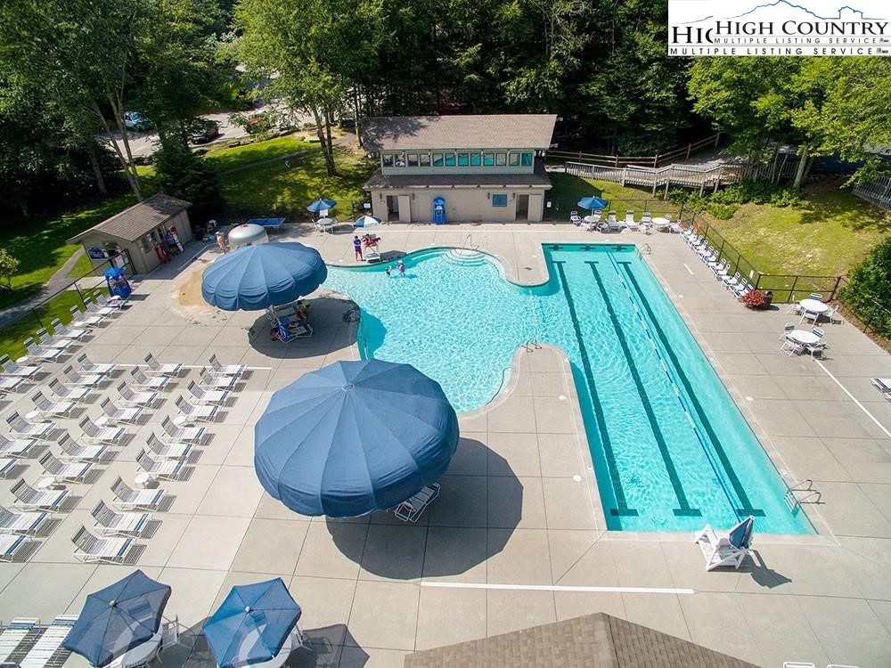 72 Sunset Strip Beech Mountain, NC 28604 - Photo 17 of 18 a view of backyard with swimming pool and outdoor seating
