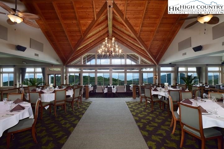 72 Sunset Strip Beech Mountain, NC 28604 - Photo 18 of 18 a very nice looking living room with lots of tables a large window and chairs