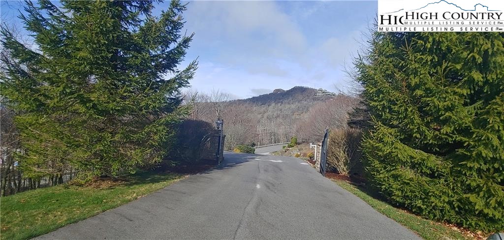 72 Sunset Strip Beech Mountain, NC 28604 - Photo 3 of 18 a view of a street with a building in the background