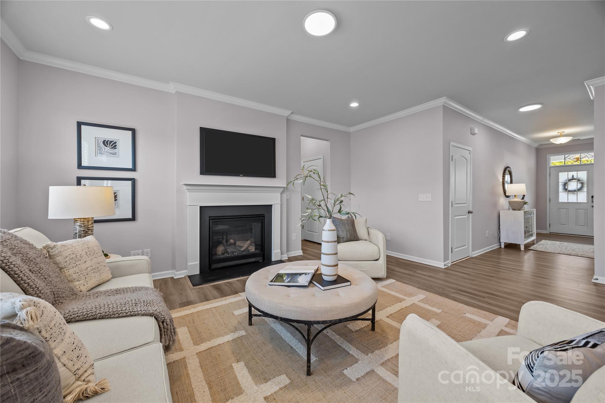16124 Fieldstone Trace Charlotte, NC 28278 - Photo 13 of 45 a living room with furniture a rug and a fireplace