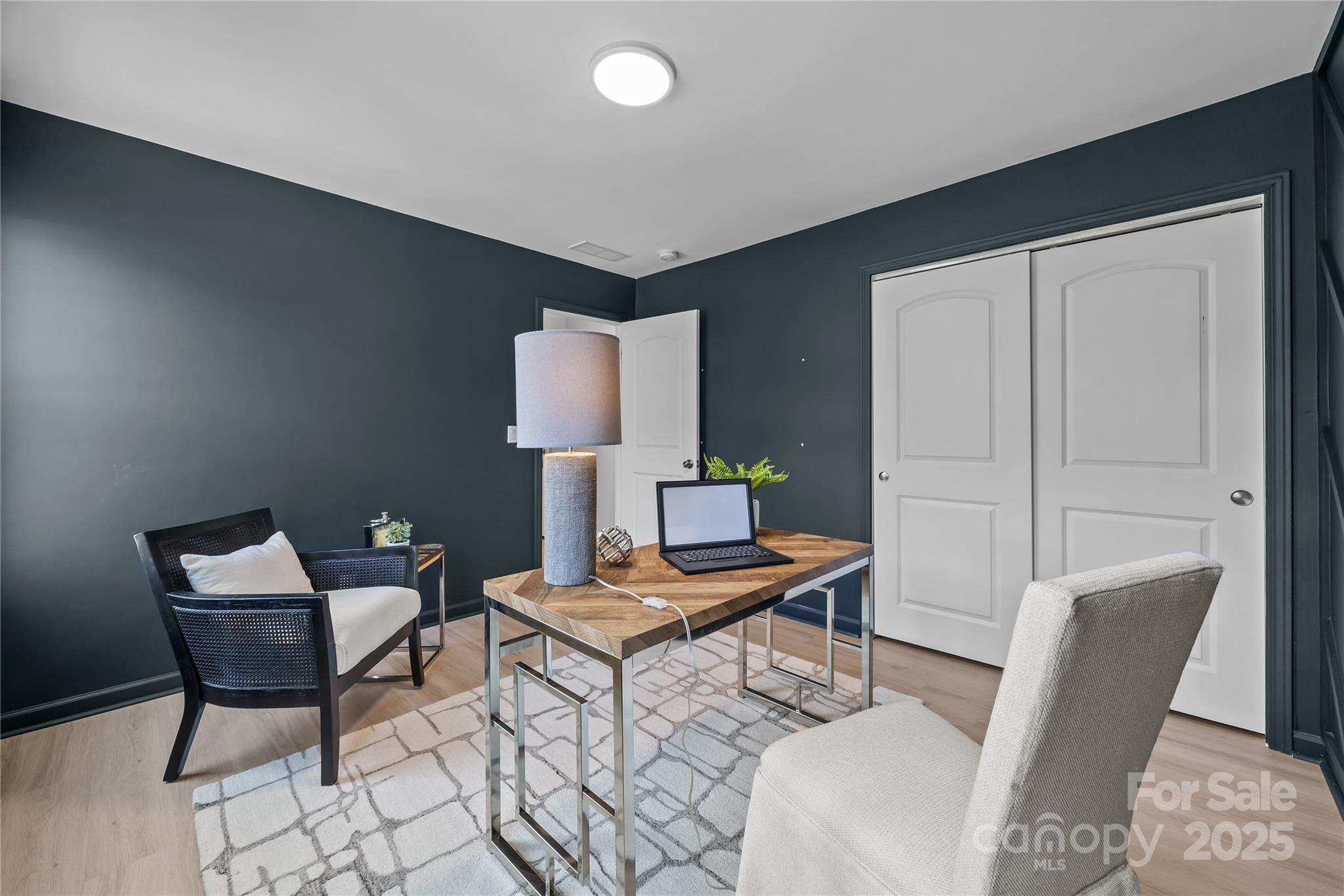 16124 Fieldstone Trace Charlotte, NC 28278 - Photo 30 of 45 a workspace with furniture and wooden floor