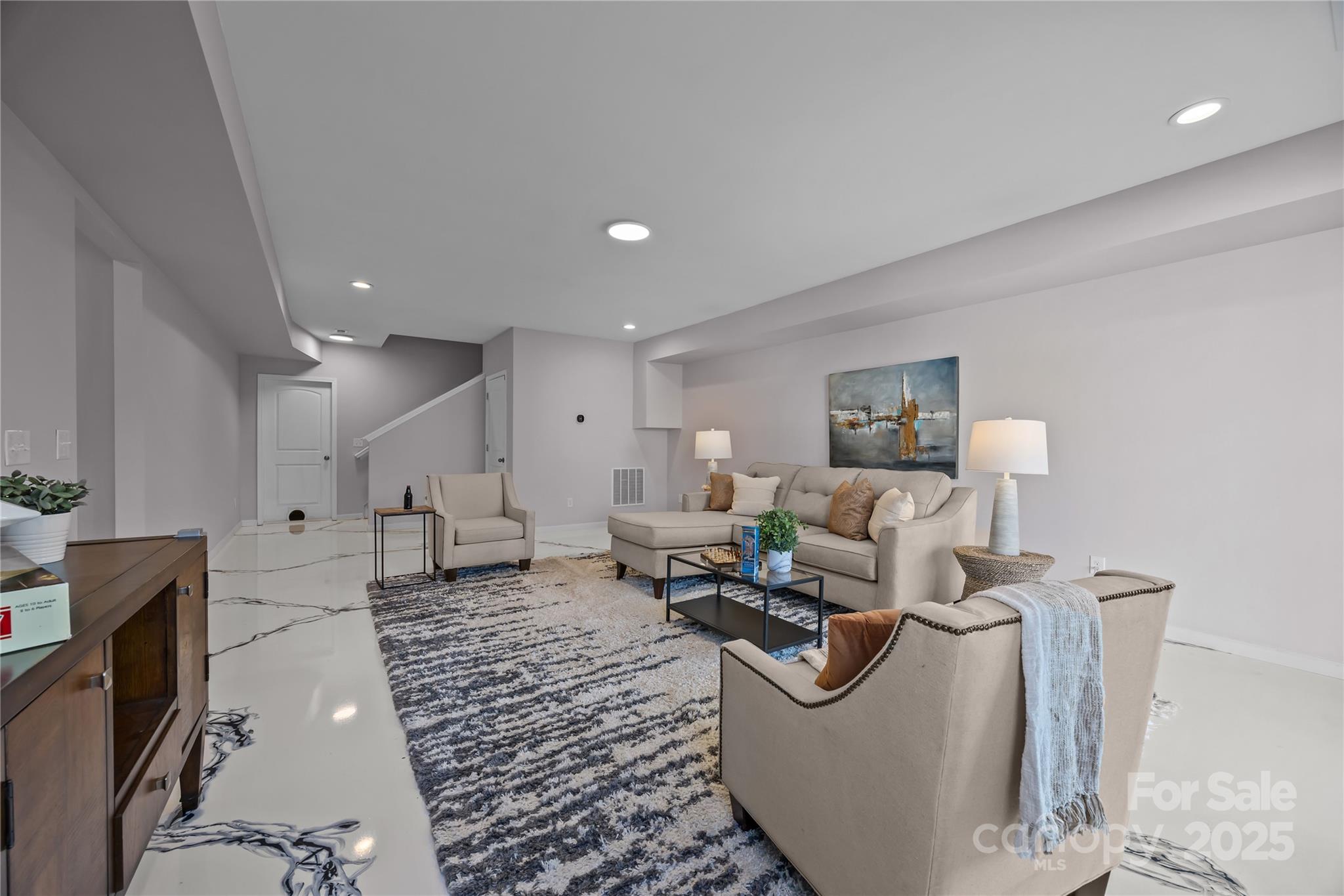 16124 Fieldstone Trace Charlotte, NC 28278 - Photo 36 of 45 a living room with furniture and a couch