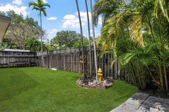 a view of a garden with a slide