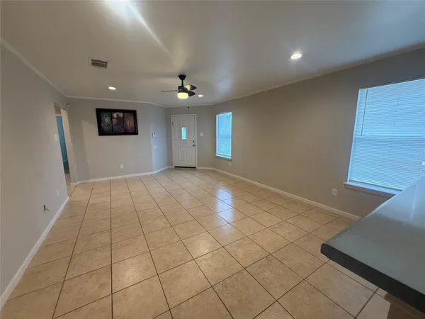 a view of hallway with stairs and a chandelier