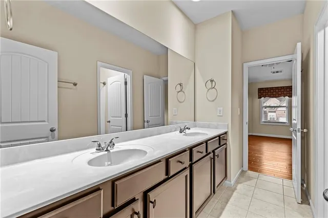 a bathroom with a shower a toilet and sink