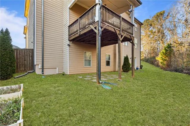 an aerial view of houses with outdoor space