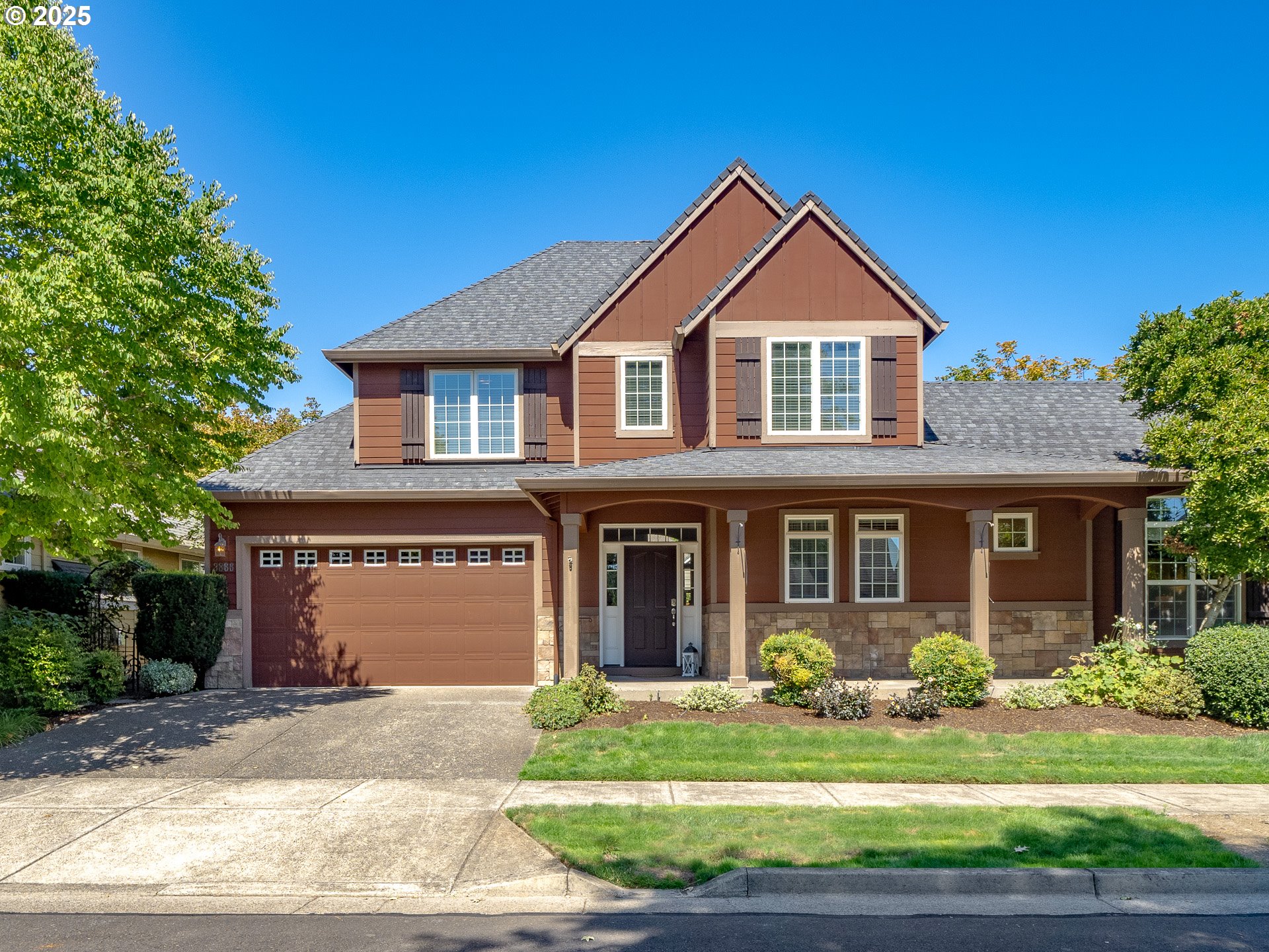3866 Oak Meadows Loop Newberg, OR 97132 - Photo 1 of 48 a front view of a house with garden