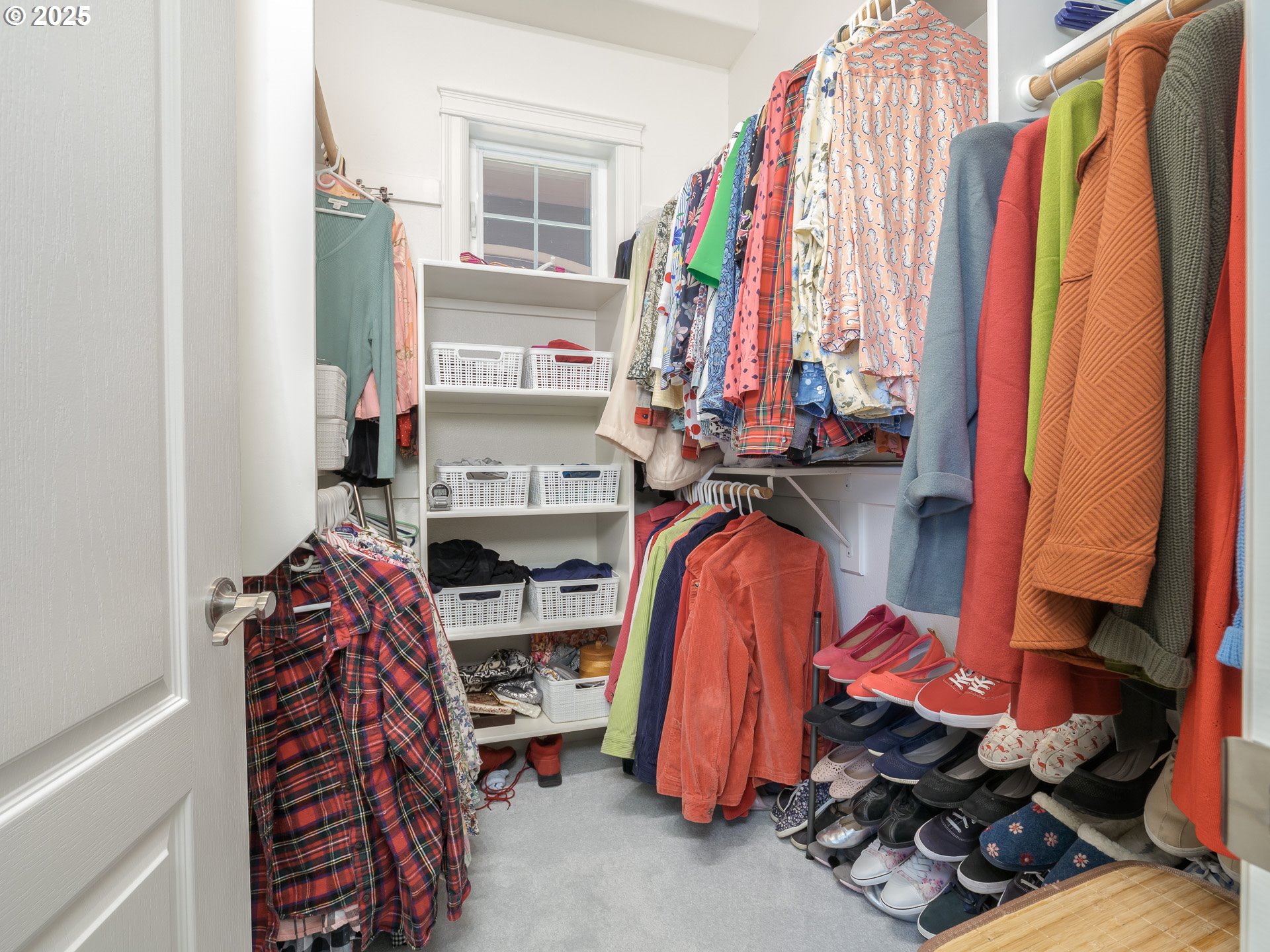 3866 Oak Meadows Loop Newberg, OR 97132 - Photo 26 of 48 a view of walk in closet with clothes and shoes