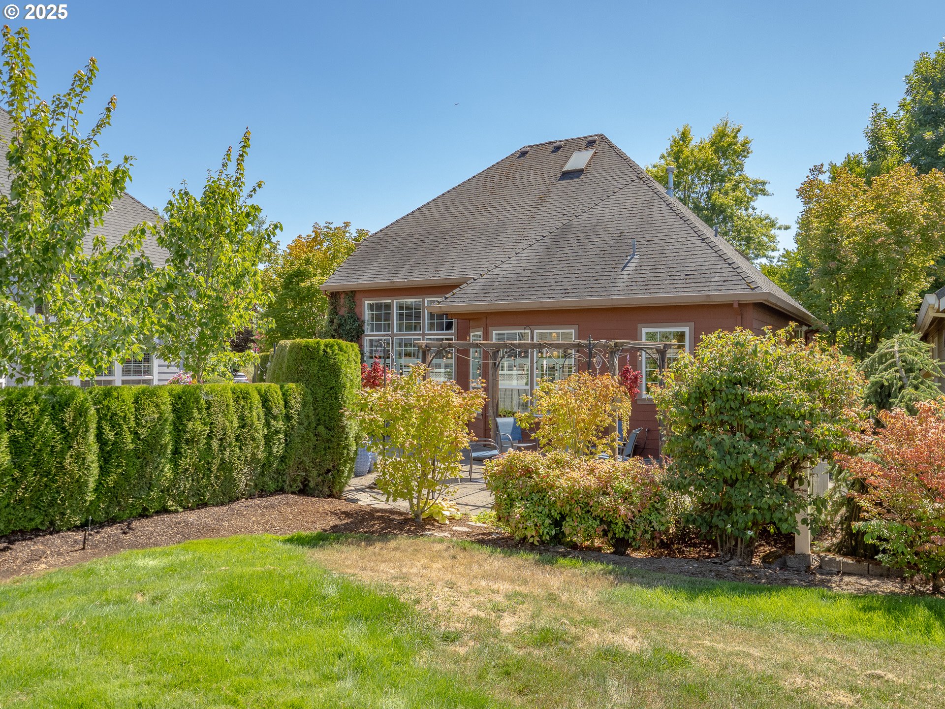 3866 Oak Meadows Loop Newberg, OR 97132 - Photo 39 of 48 a view of a house with backyard and garden
