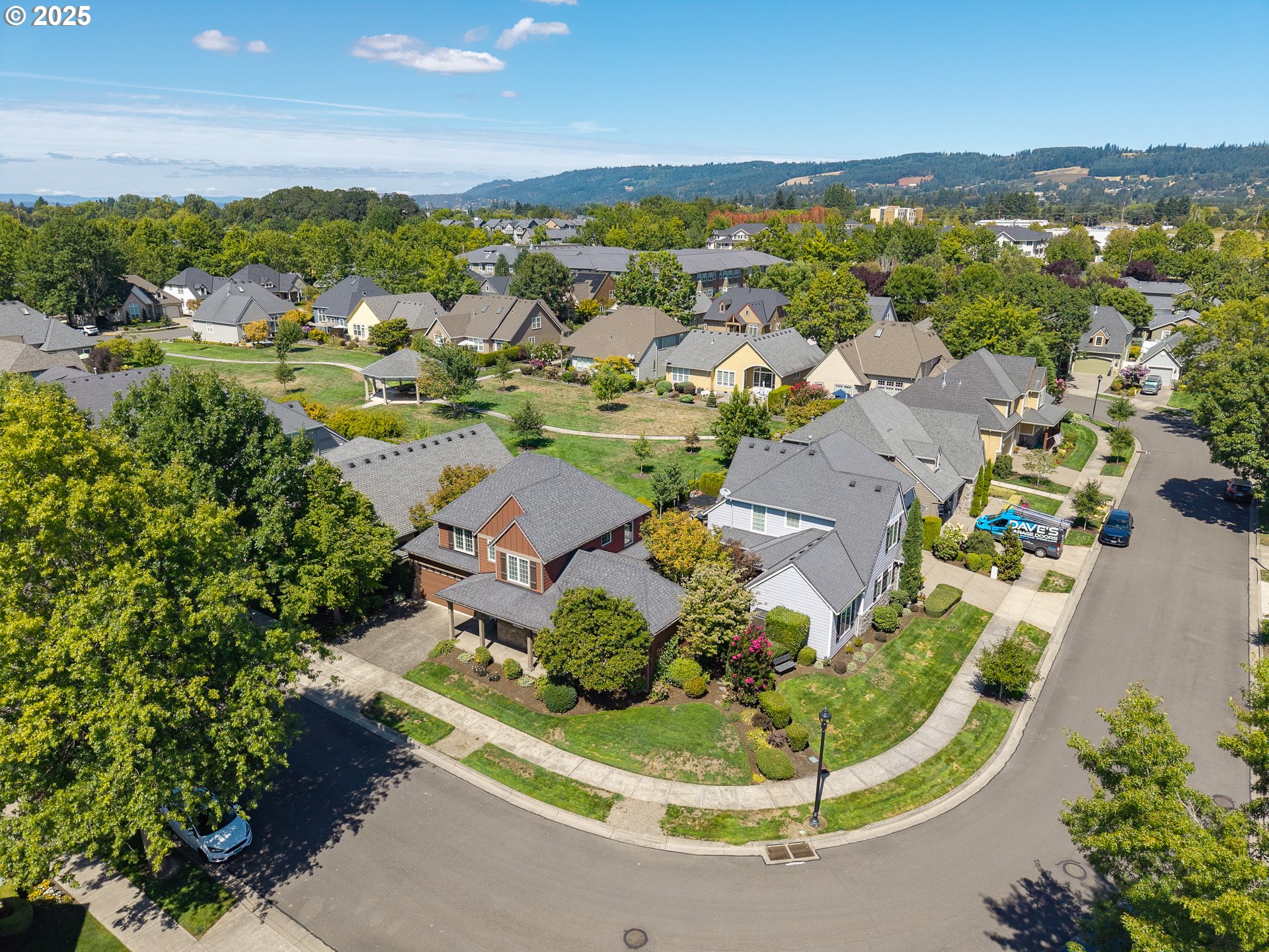 3866 Oak Meadows Loop Newberg, OR 97132 - Photo 44 of 48 an aerial view of residential houses with outdoor space and trees