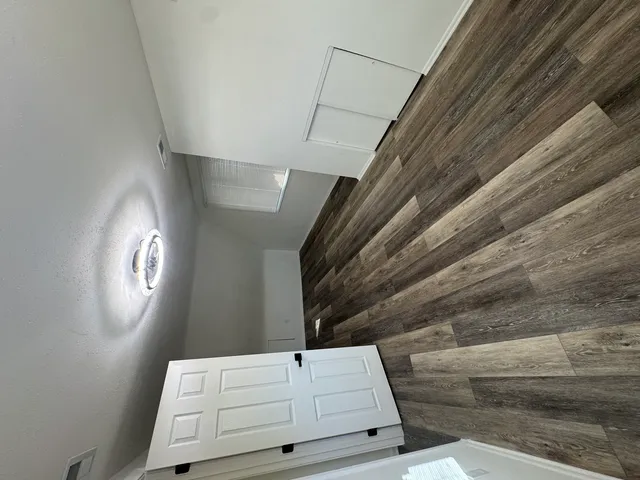 a view of staircase with window