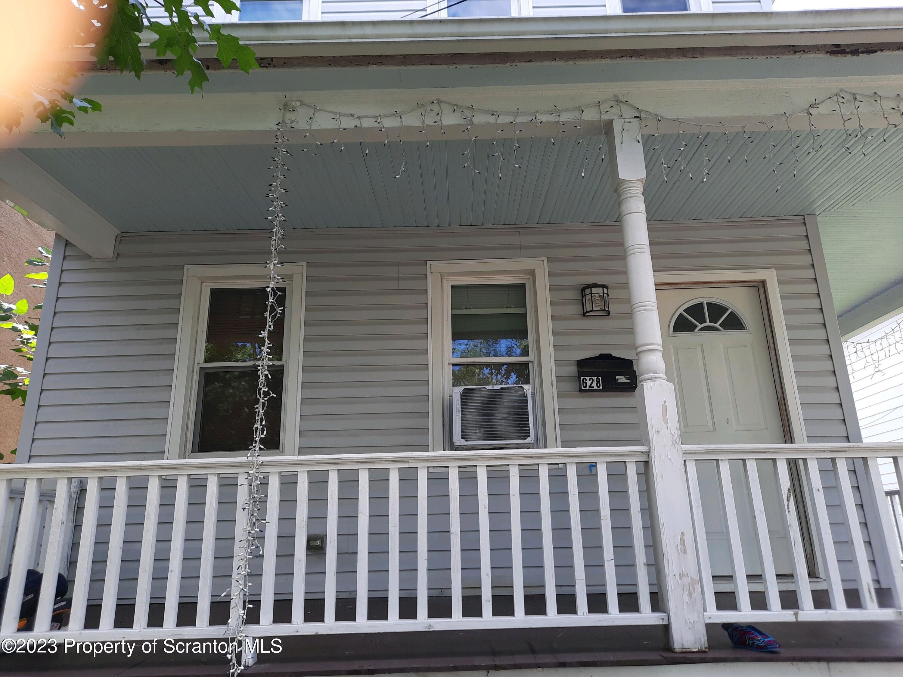 628 East Locust Street Scranton, PA 18505 - Photo 11 of 12 a view of a brick house with a window