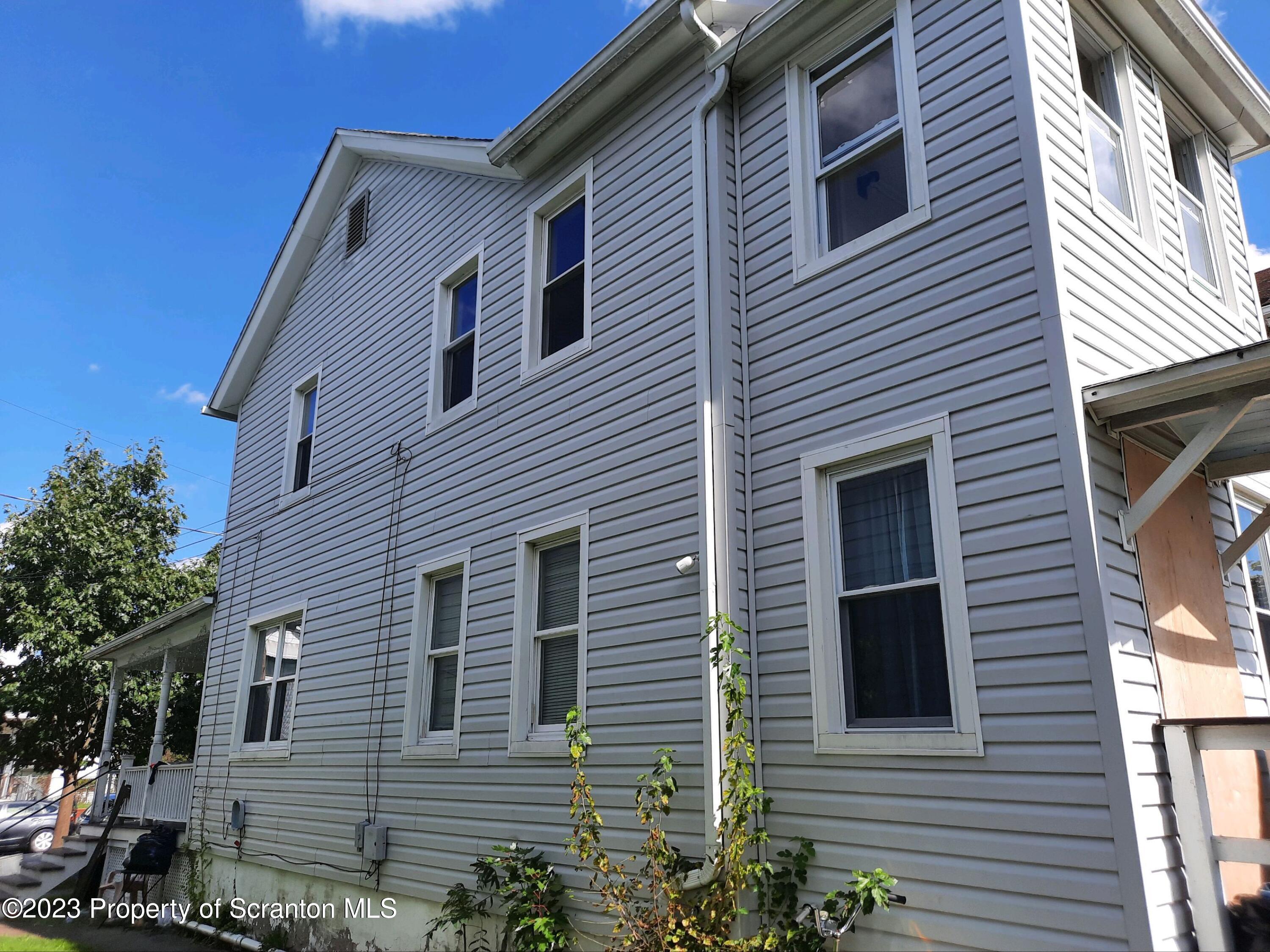 628 East Locust Street Scranton, PA 18505 - Photo 9 of 12 a side view of a house