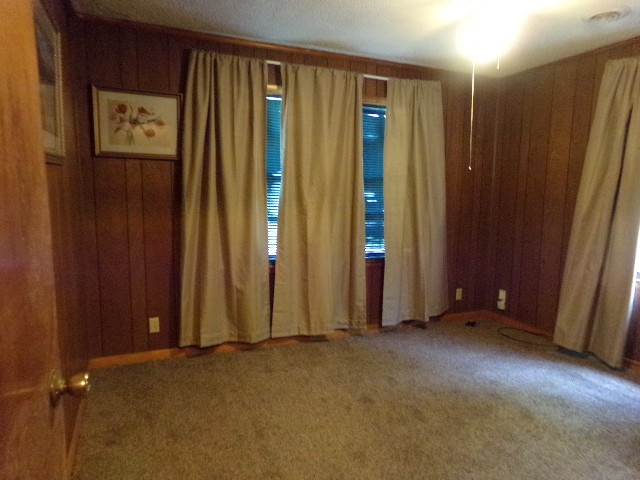 12 Knight Street Erin, TN 37061 - Photo 3 of 7 an empty room with windows