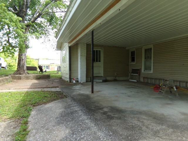 12 Knight Street Erin, TN 37061 - Photo 7 of 7 a view of a house with backyard
