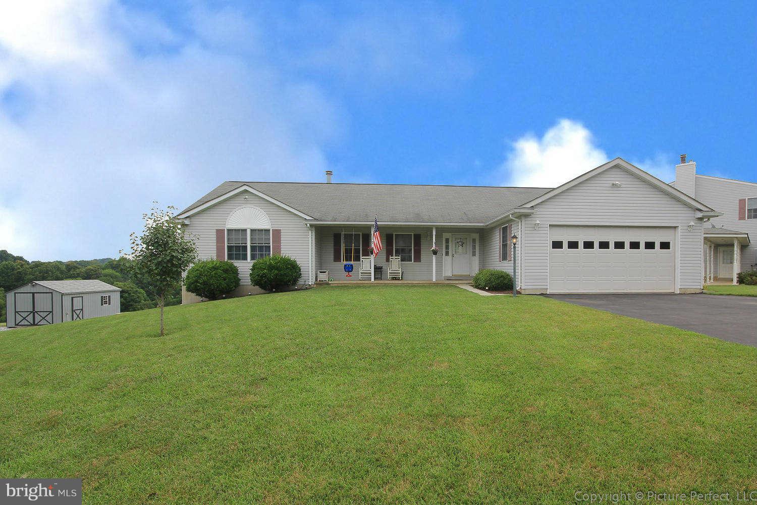 13132 Jesse Smith Road Mount Airy, MD 21771 - Photo 3 of 30 a view of a house with a back yard