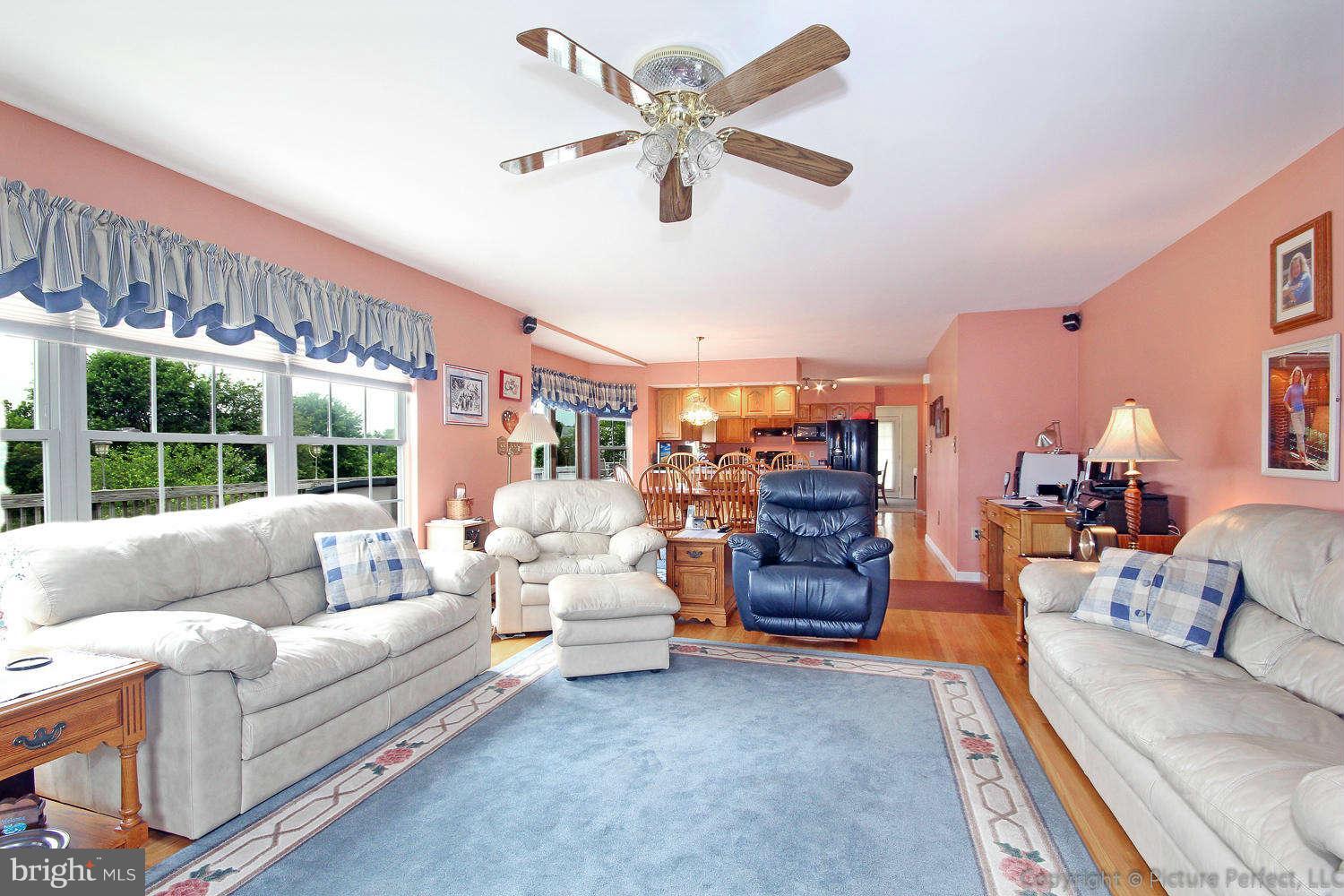 13132 Jesse Smith Road Mount Airy, MD 21771 - Photo 8 of 30 a living room with furniture and a large window