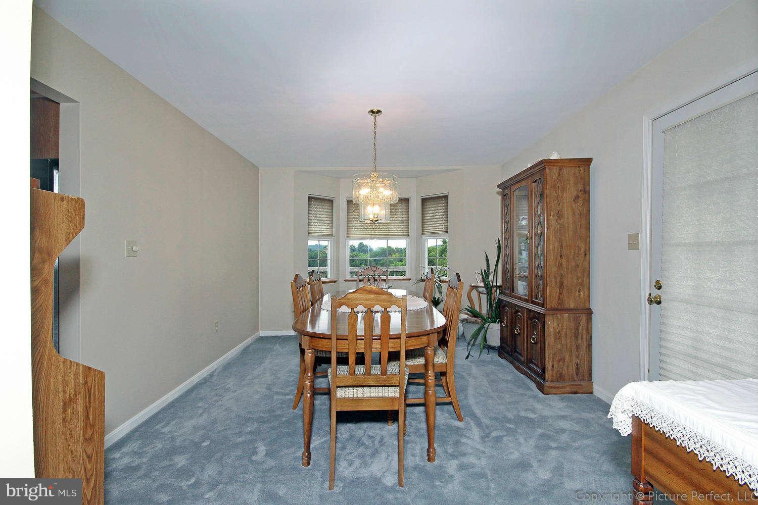 13132 Jesse Smith Road Mount Airy, MD 21771 - Photo 10 of 30 a dining room with furniture and window