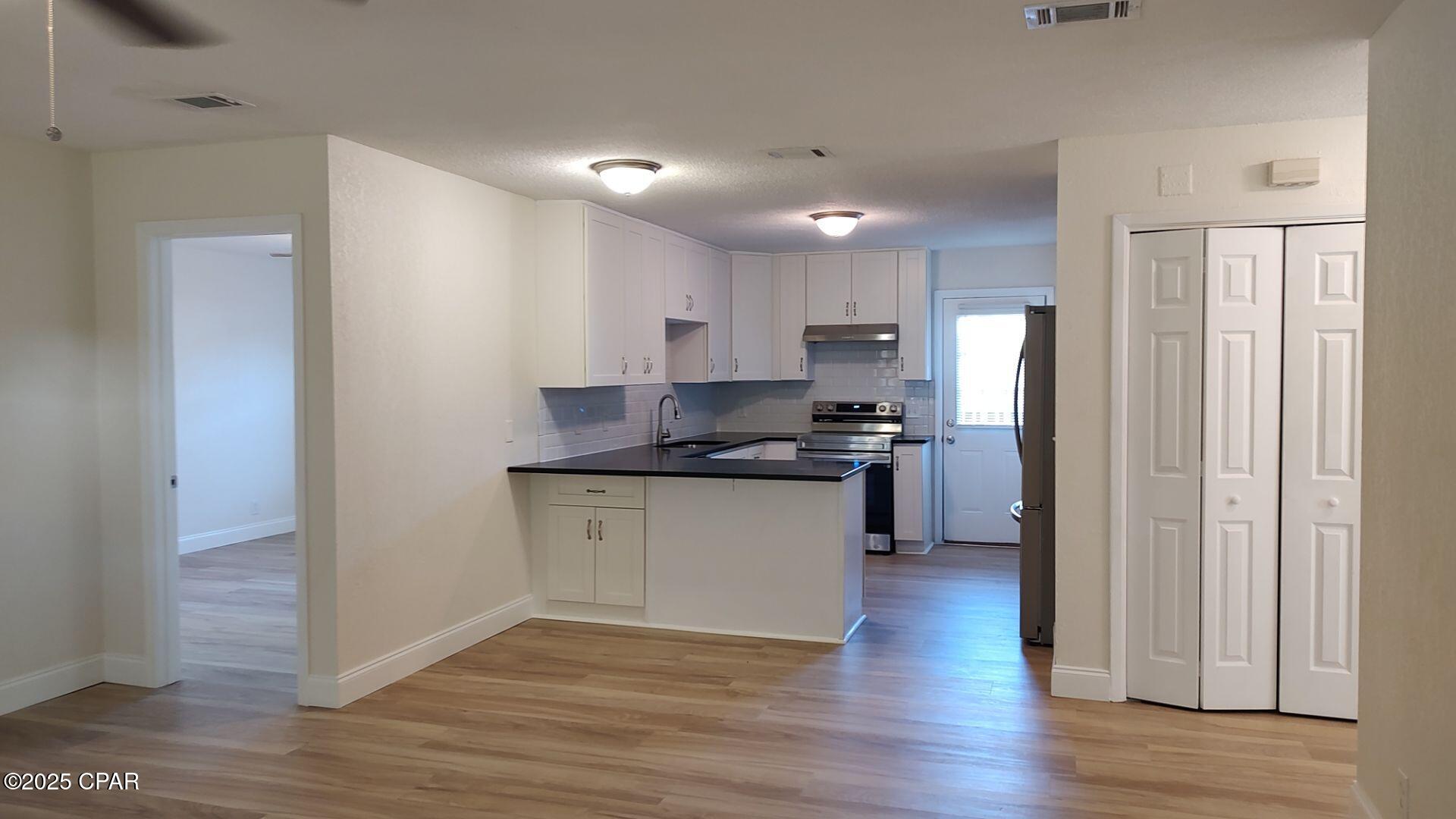 6217 Pinetree Avenue, Unit B Panama City Beach, FL 32408 - Photo 3 of 14