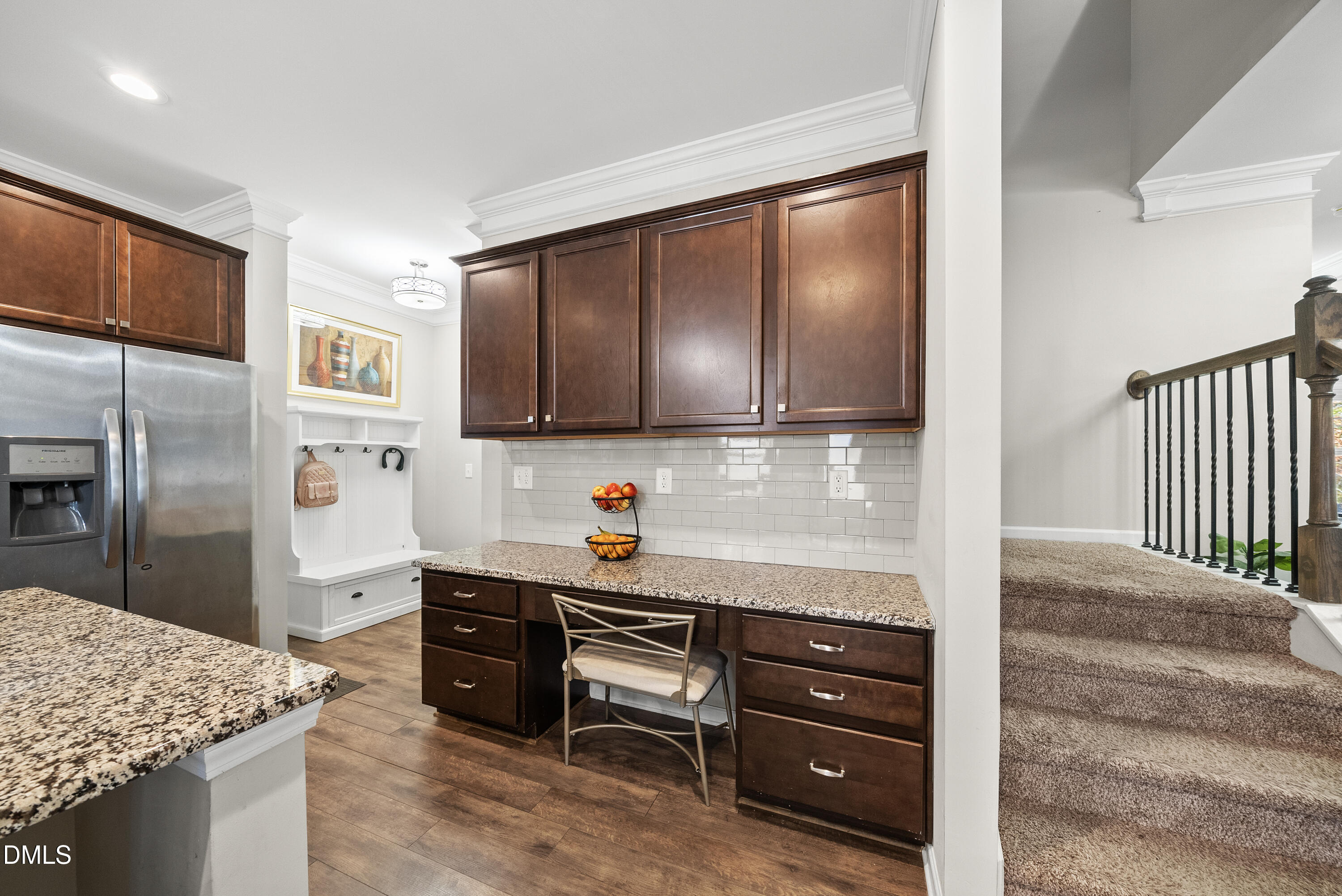 306 Springhill Lane Garner, NC 27529 - Photo 20 of 43 a kitchen with stainless steel appliances granite countertop a refrigerator and a sink