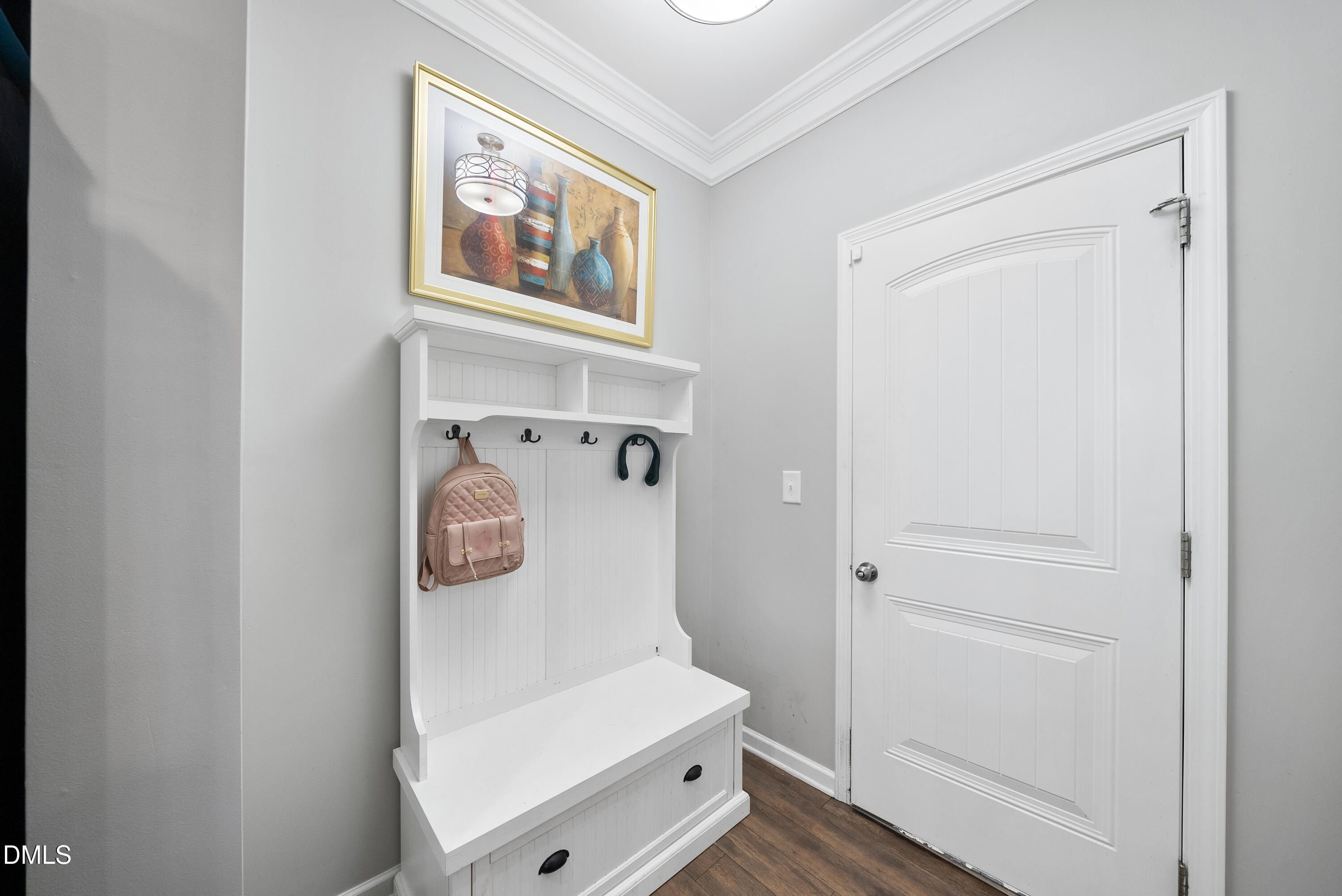 306 Springhill Lane Garner, NC 27529 - Photo 21 of 43 a hallway with painting on the wall and a shower