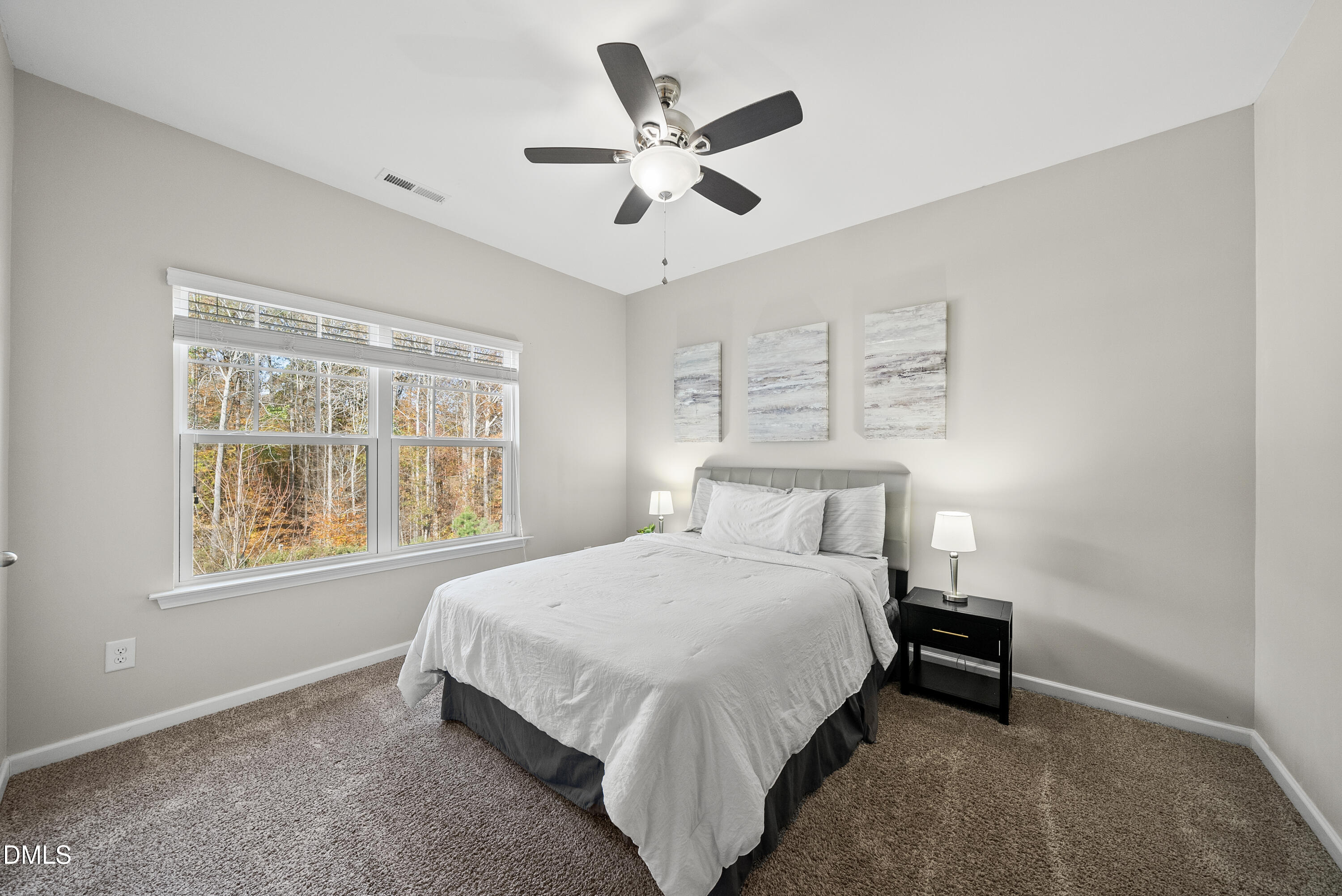 306 Springhill Lane Garner, NC 27529 - Photo 26 of 43 a bedroom with a bed and window
