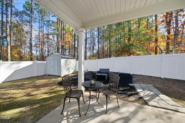 a room with furniture and a large window